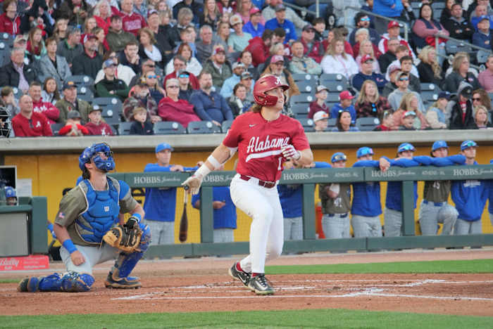 Alabama designated hitter Will Hodo (1) watches the ball after a swing in the Crimson Tide's 10-4 win over Middle Tennessee State on March 28, 2023 at Toyota Field in Madison, Ala.